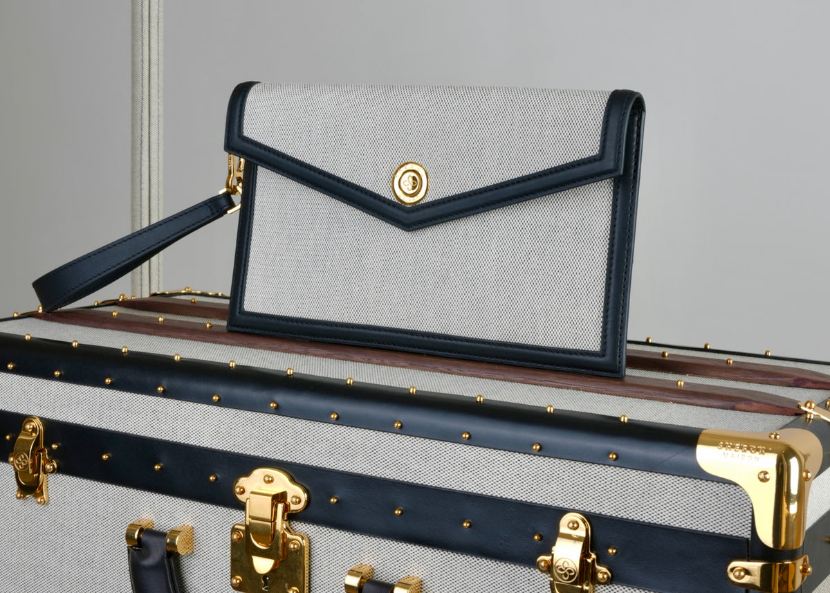 Maison Shéron Envelope Pochette on an Aquilo trunk